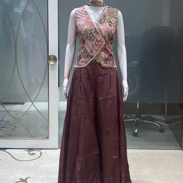 Mauve, deep plum, gold, and dusty rose Co-ord set featuring a sleeveless wrap-style peplum top and wide-leg trousers