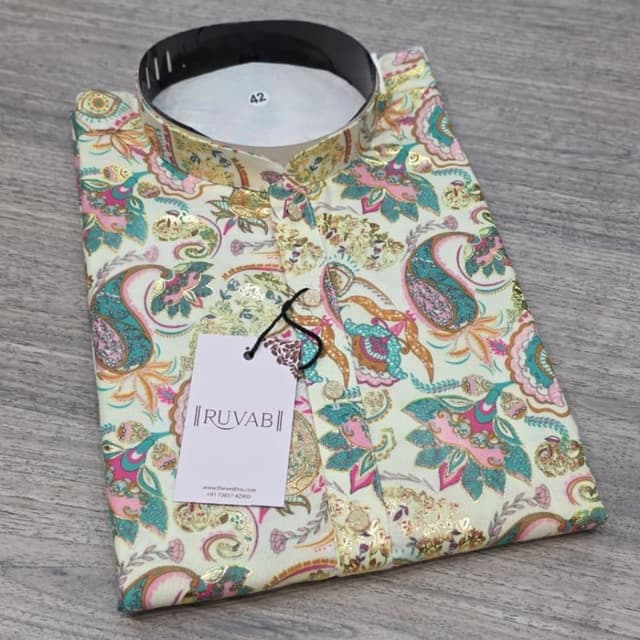 Off-white base with turquoise, pink, yellow, and metallic gold accents Kurta