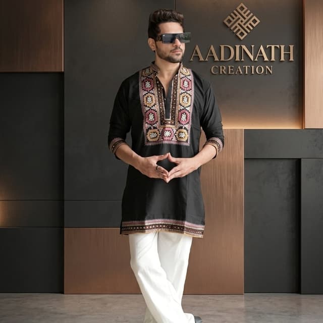 Black base with multi-colored embroidery (pink, gold, white, brown) Kurta
