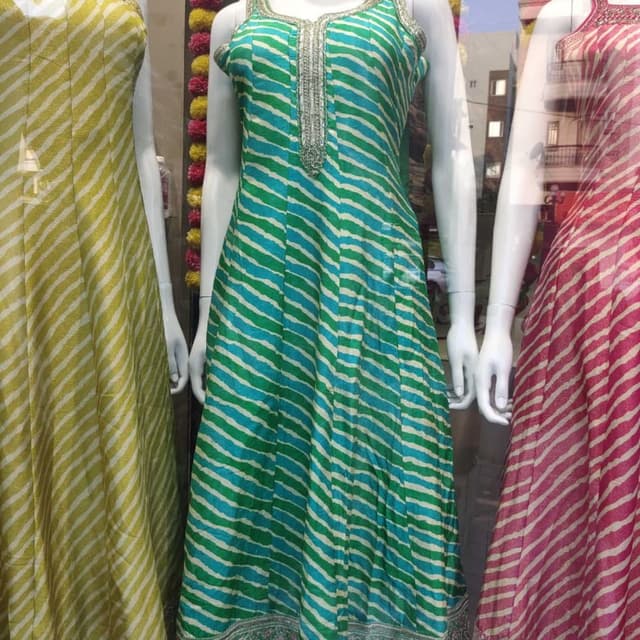 Teal and off-white Anarkali Suit