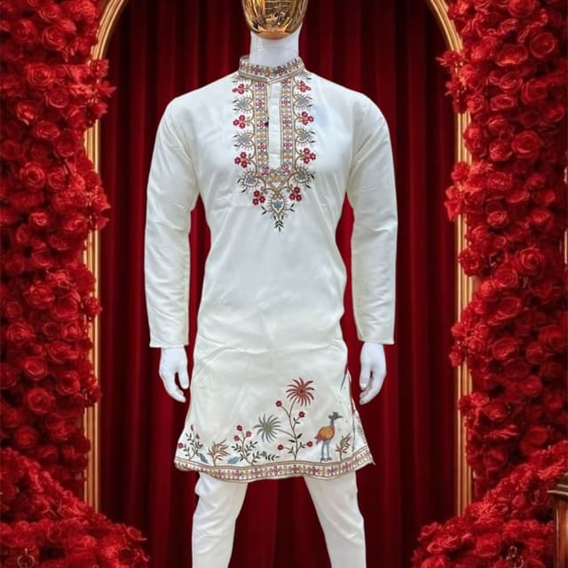 Off-white base with multicolor embroidery including red, yellow, blue, and metallic gold Kurta with Pajama