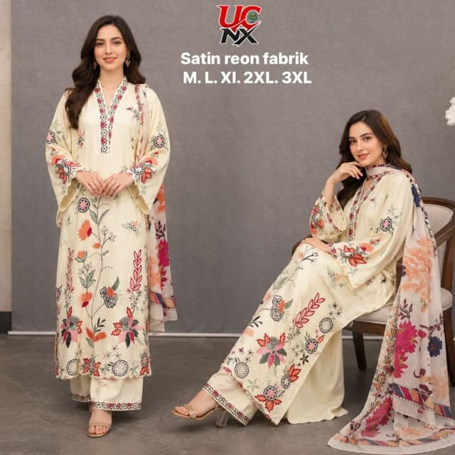 Off-white base with multi-colored floral print (pink, red, orange, green, and black accents) Salwar Kameez Set