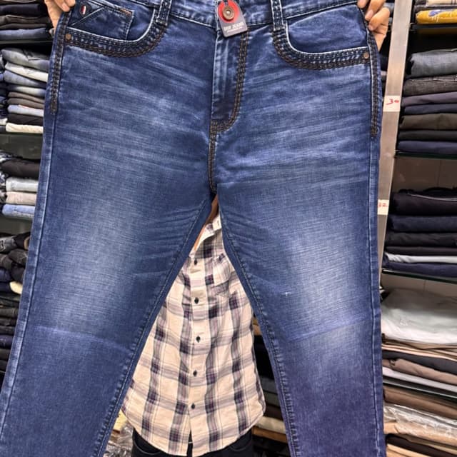 Medium blue with whiskering and fading Jeans