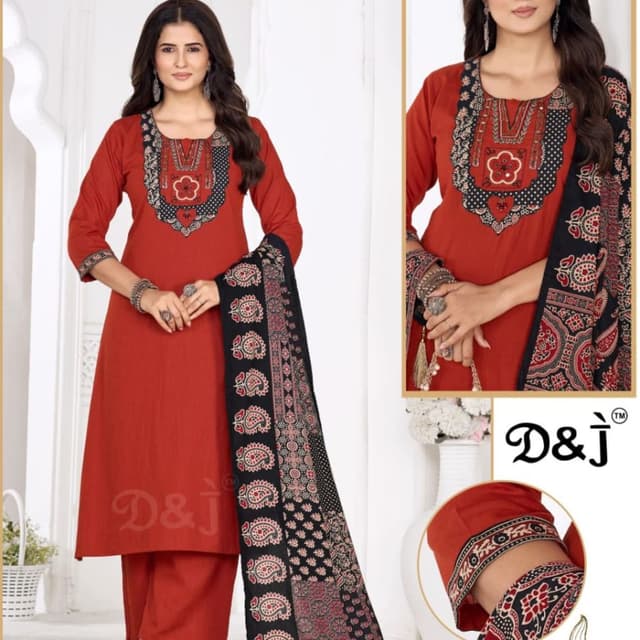 Rust red and black with accents of white Salwar Kameez set