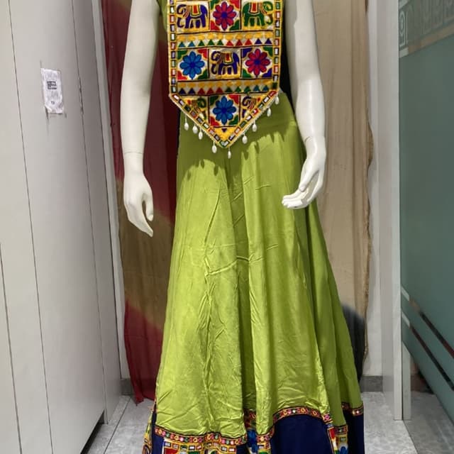 Lime green base with dark blue accents and multi-colored embroidery (red, yellow, blue, green) Lehenga Choli