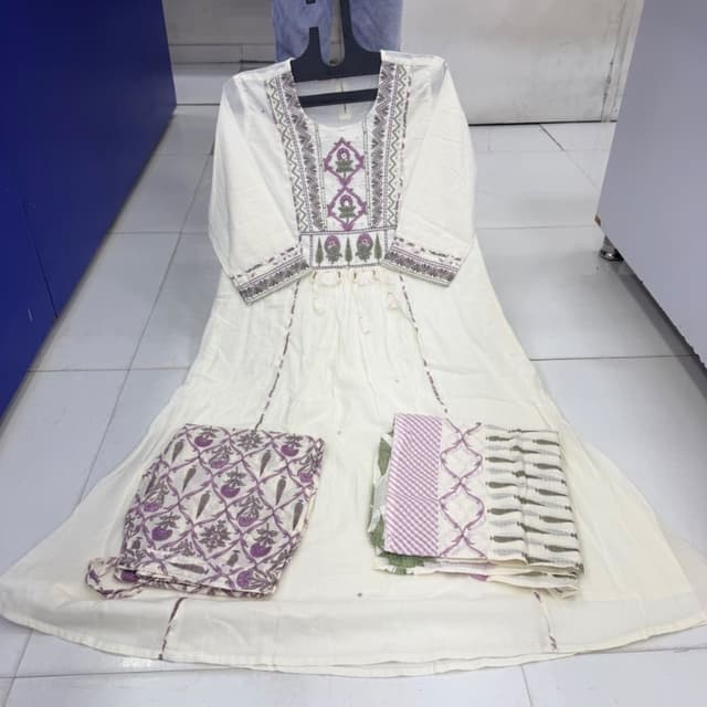 Off-white base with purple, muted green, and grey accents Kurti Set