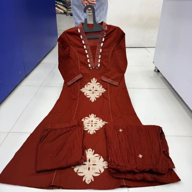 Rust brown base with off-white accents Kurti set with pants and dupatta