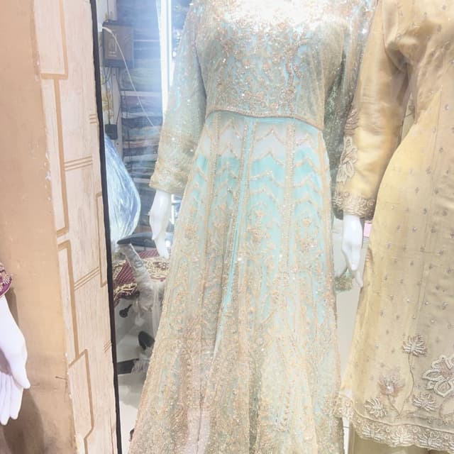Light aqua blue with heavy gold embroidery Anarkali Gown