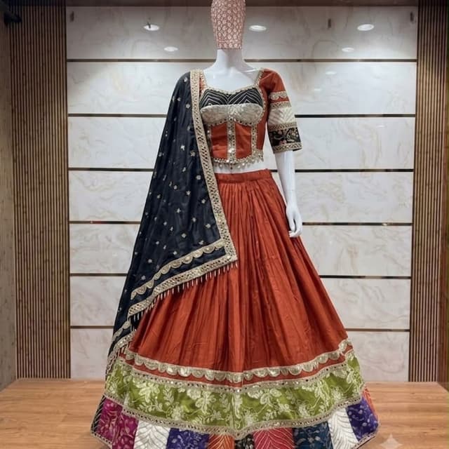 Rust orange, black, white, lime green, and multicolor panels Lehenga Choli