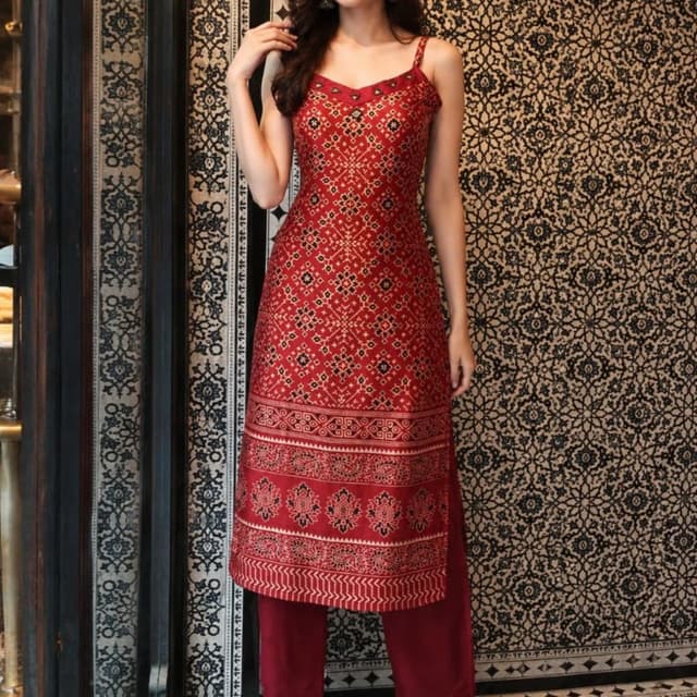 Deep maroon, gold, and black Kurta set