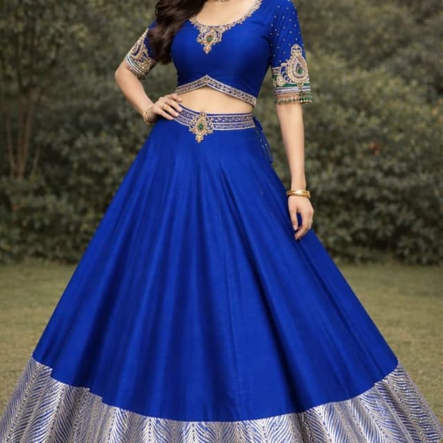 Royal blue with silver metallic border and hints of green in embellishments Lehenga Choli