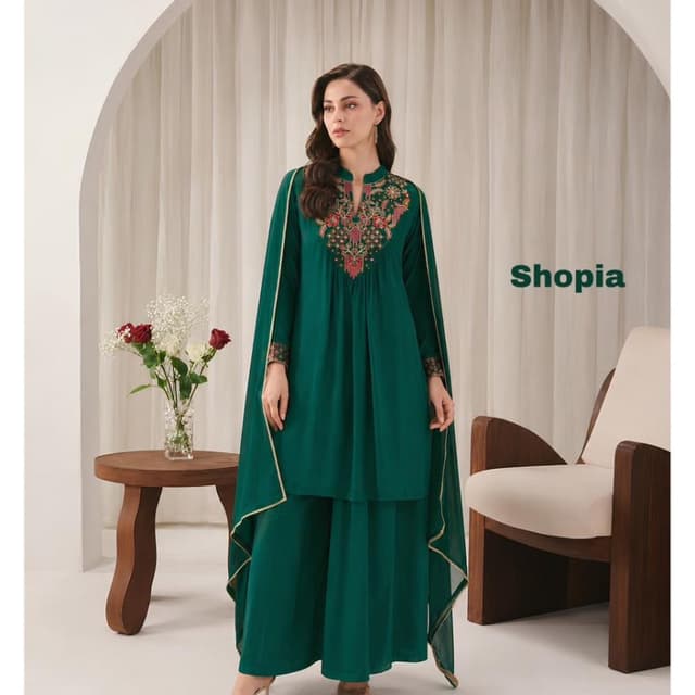 Deep forest green, accented with pink, red, and gold embroidery Salwar Kameez with Cape