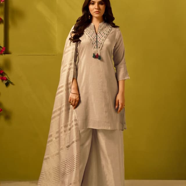 Light grey/taupe base with multi-colored embroidery and dark green/maroon tassels Kurta set with dupatta