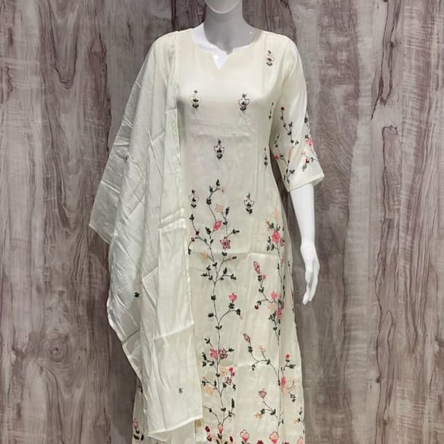 Off-white or cream base with multi-colored floral embroidery in pink, green, and orange shades. Kurta Set with Dupatta