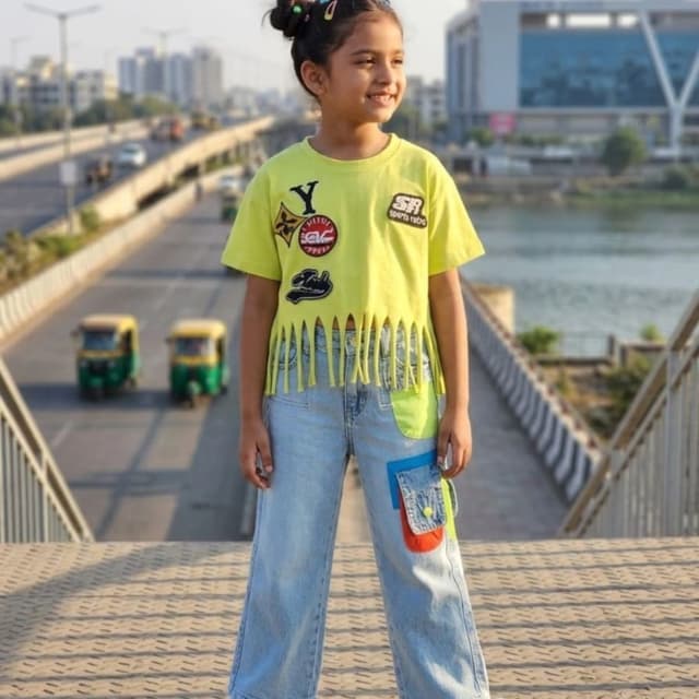 Neon yellow, light blue denim, pops of red, orange, and blue T-shirt and jeans set