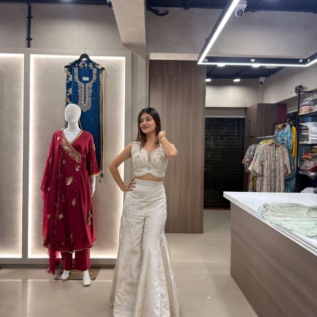 Off-white or cream with subtle silver undertones Lehenga Choli set