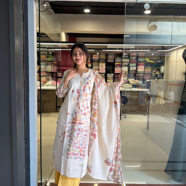Off-white base with multicolor pastel accents (peach, blue, yellow) and solid mustard yellow pants Kurta Set with Dupatta