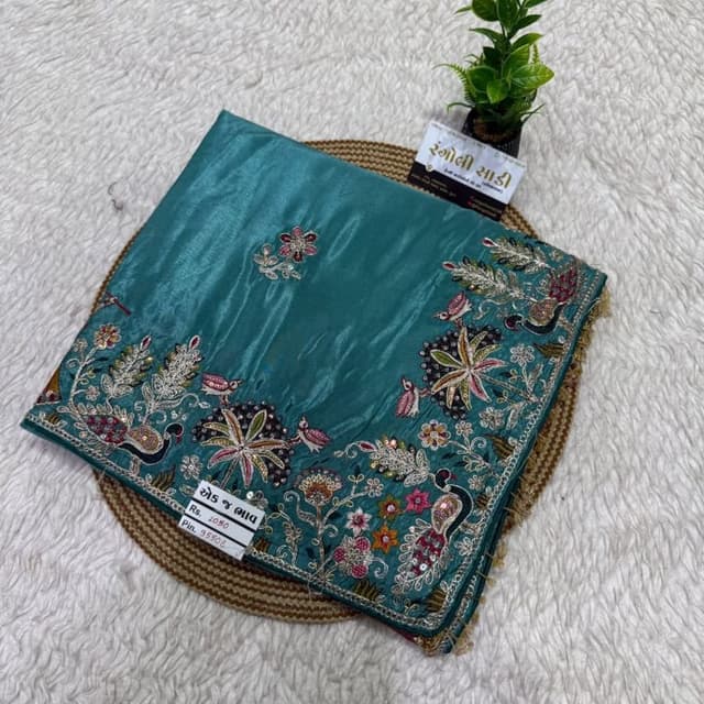 Teal green base with multi-colored thread work (pink, white, maroon, gold, green) Saree