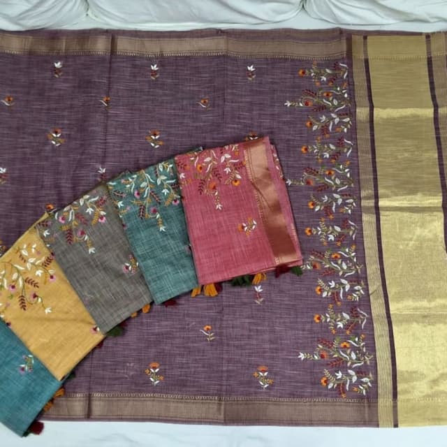 Purple, dusty rose, teal, and charcoal grey with copper metallic accents Saree