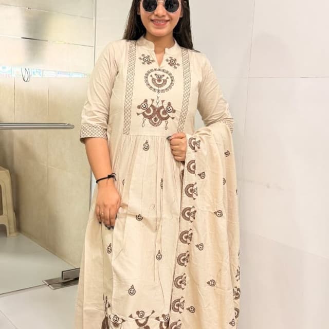 Off-white base with dark brown printed motifs Kurta Set with Dupatta
