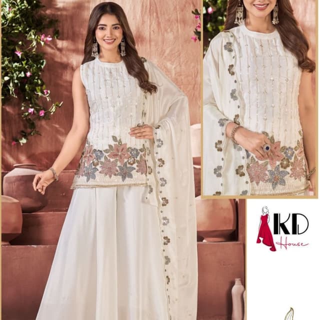 Off-white base with multi-colored floral embroidery in dusty pink, grey, and sage green Sharara Set
