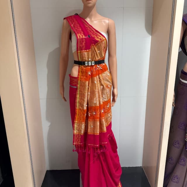 Hot pink, vibrant orange, and metallic gold Saree