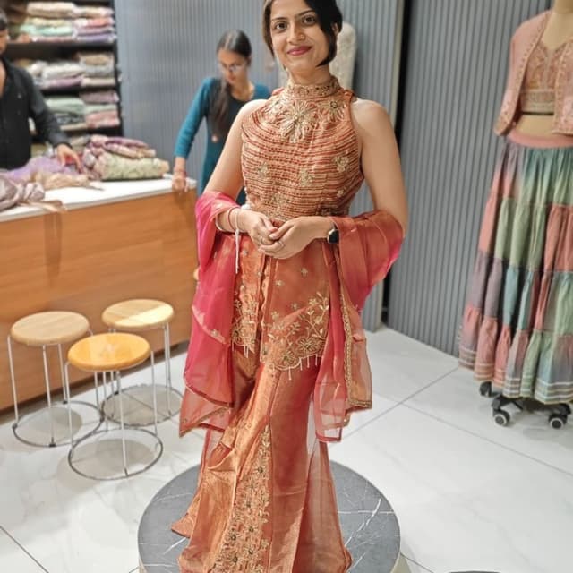 Rust, copper, and warm pink/coral tones Sharara Set