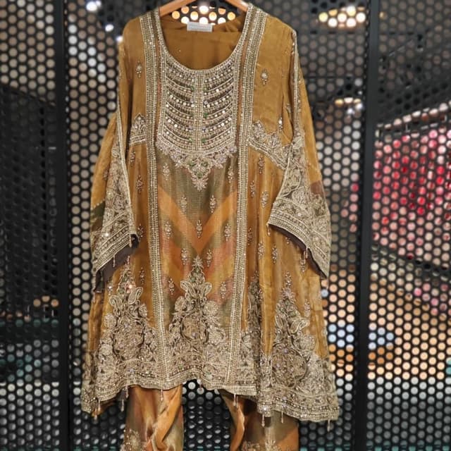 Mustard gold, metallic bronze, and hints of muted green/rust Salwar Kameez