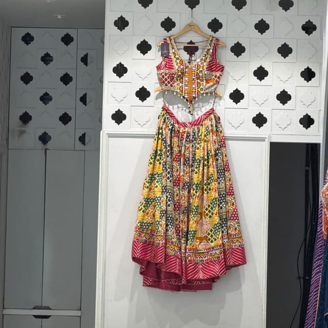 Multi-colored with dominant red, yellow, green, and white Lehenga Choli