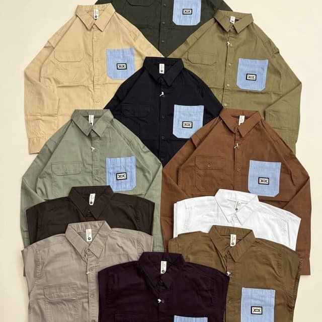 Earth tones such as olive green, khaki, brown, black, white, and tan, with contrasting light blue striped pocket accents Shirt