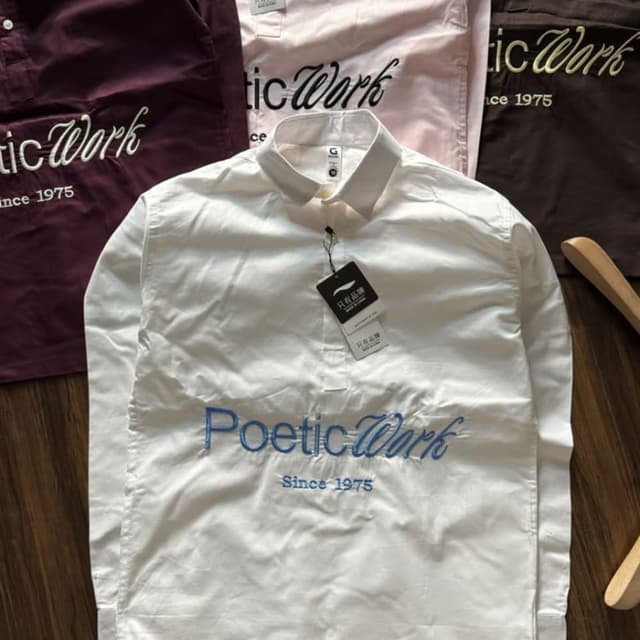 White with blue text Shirt
