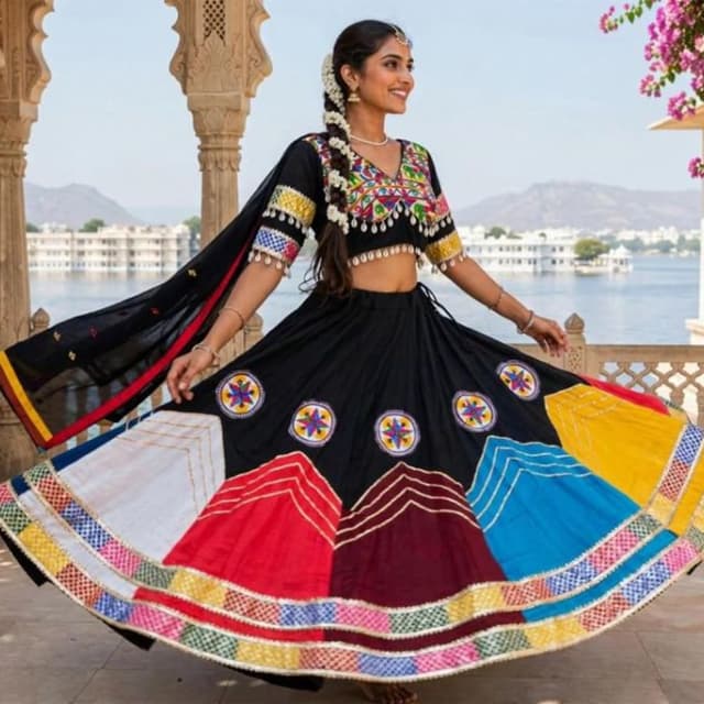 Black base with multi-colored accents including red, maroon, blue, and yellow with gold highlights Lehenga Choli