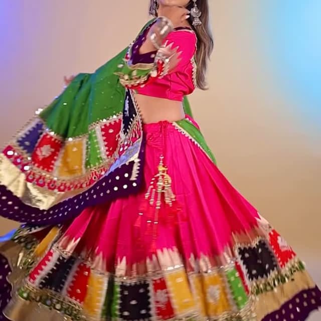 Hot pink, vibrant green, deep purple, mustard yellow, red, and gold Lehenga Choli