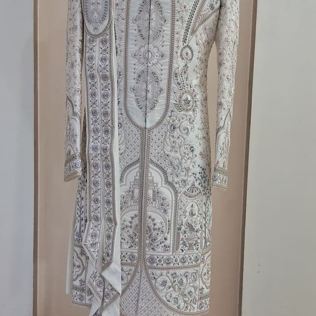 Off-white, cream, and silver threadwork Sherwani
