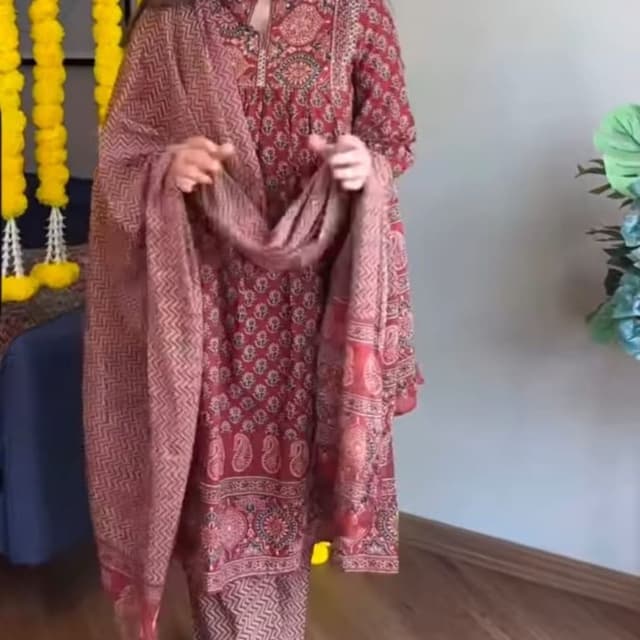 Maroon, earthy red, and muted gold or mustard highlights Kurta Set with Dupatta