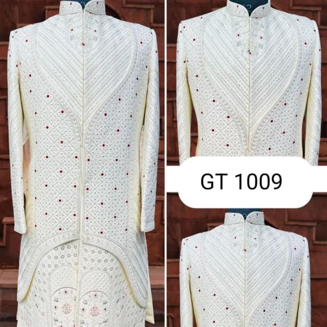 Off-white or cream base with deep red bead or stone accents Sherwani
