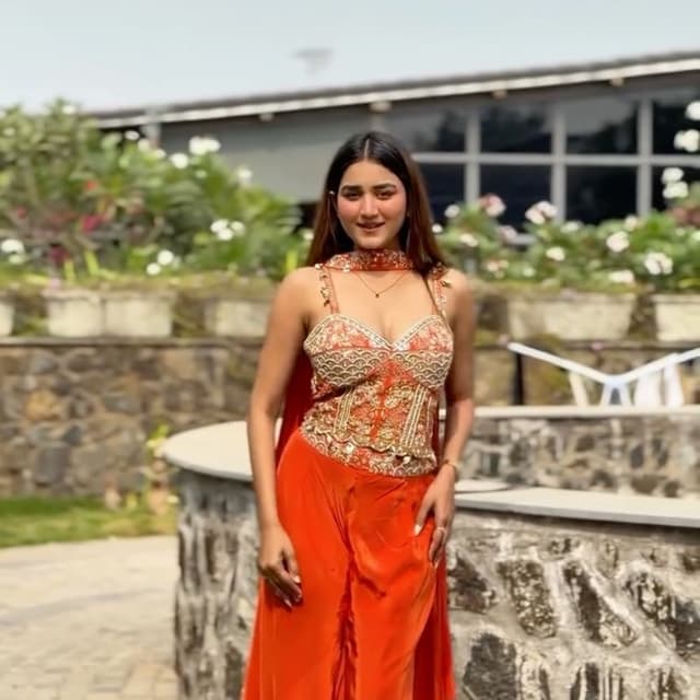 Vibrant Orange and Gold Lehenga Choli with dupatta