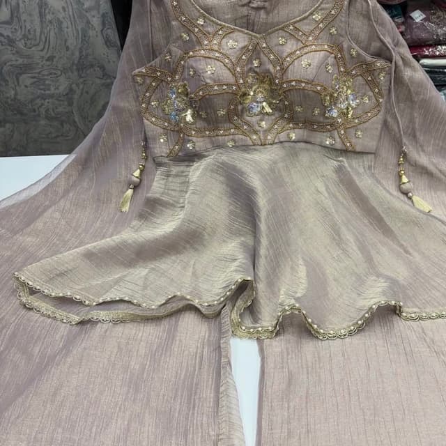 Mauve, light purple with gold undertones Peplum top and sharara set