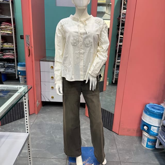 Off-white blouse, dark charcoal brown jeans Blouse and Jeans Outfit