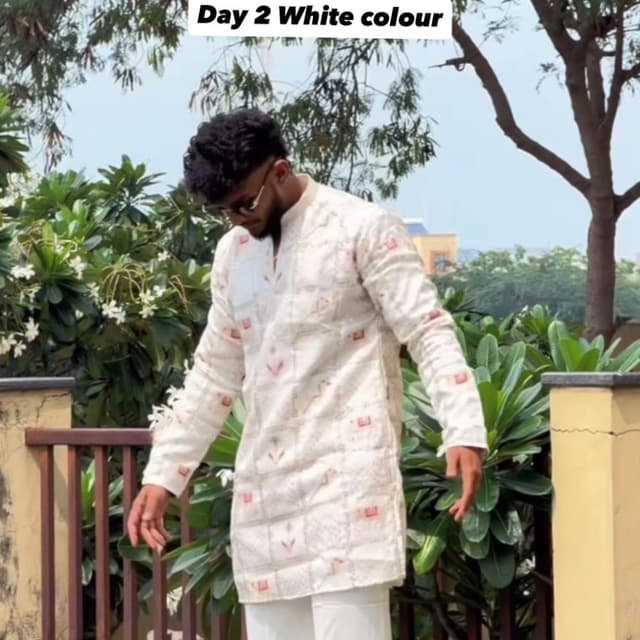 Off-white base with small red/maroon accent patterns Kurta Pyjama set