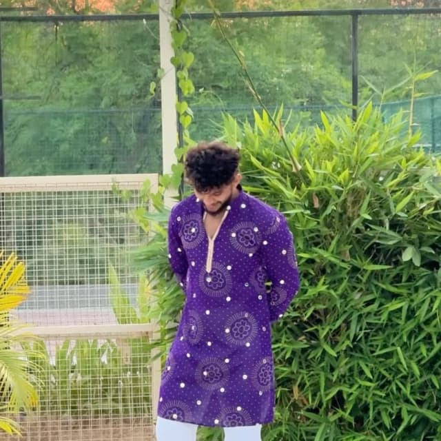 Deep purple with white contrasting accents and gold/light trim Kurta
